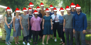 Group photo of the chair with christmas hats