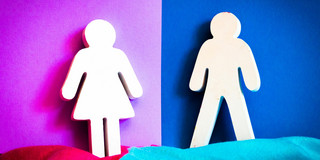 Symbolic image: Silhouettes of a woman and a man.